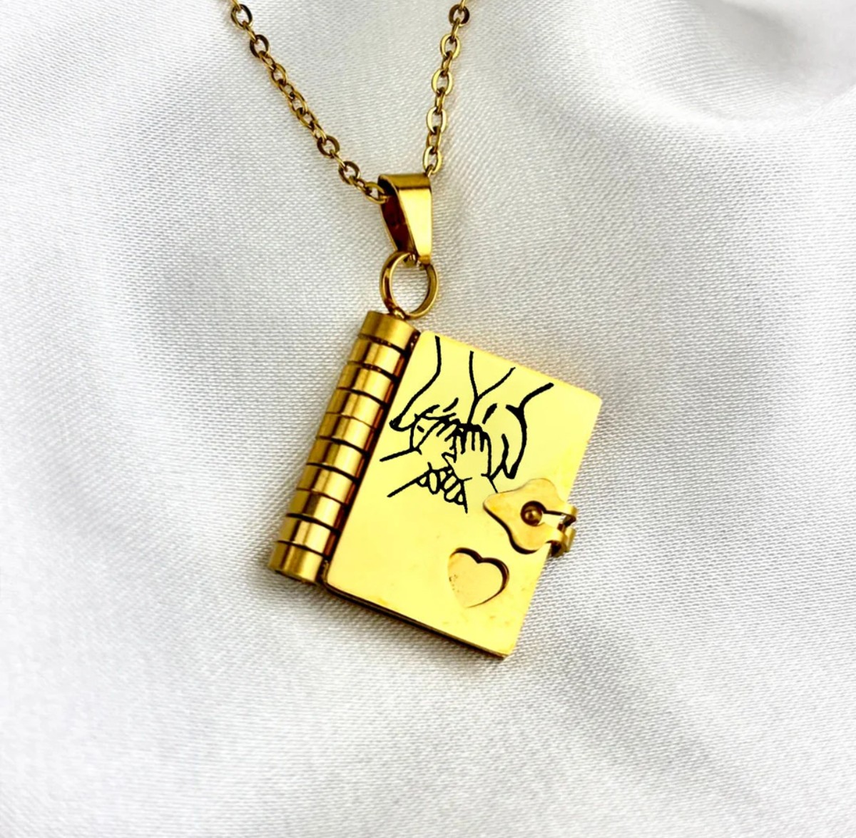 Gold book pendant
